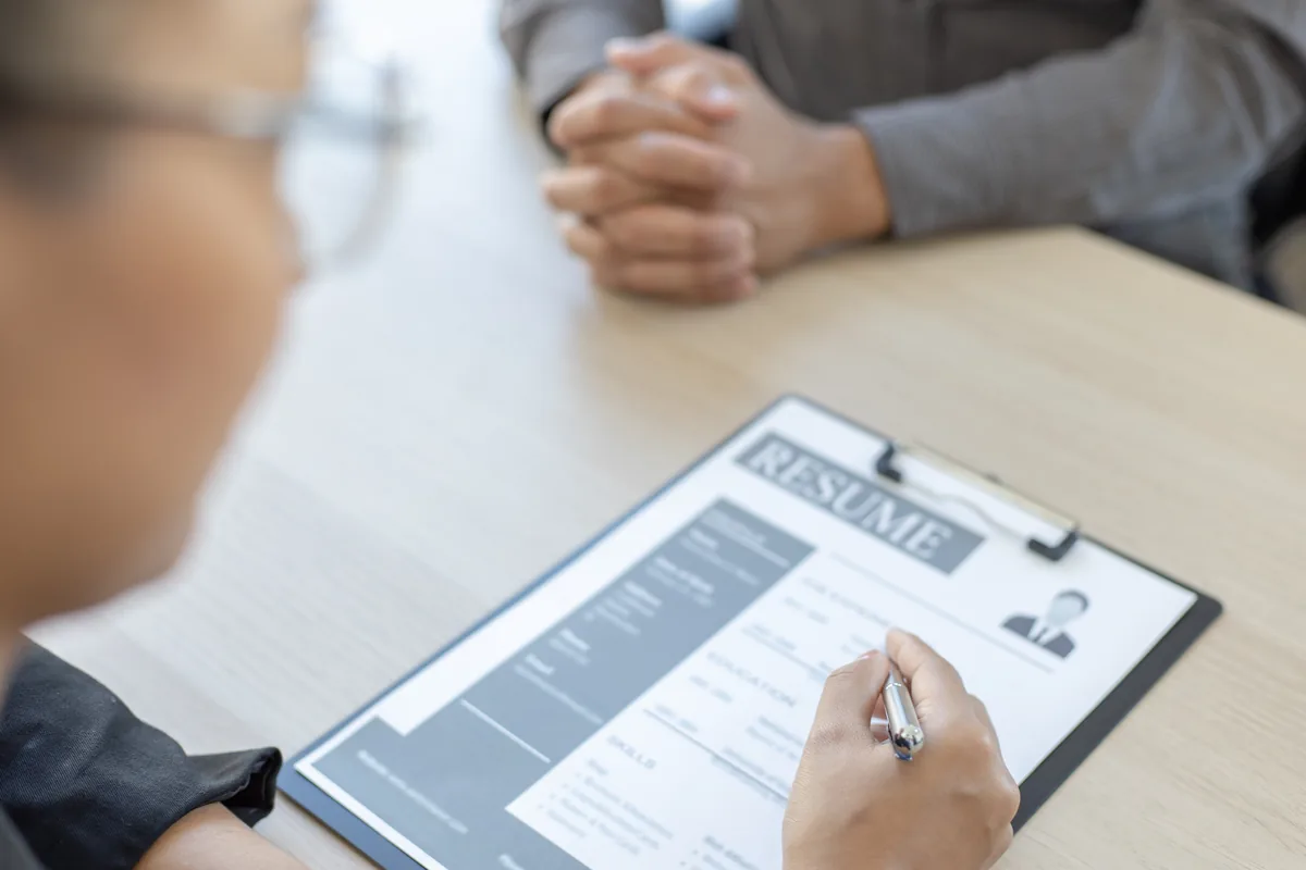 A recruiter reviewing candidate applications